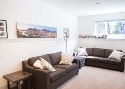 Family room in lower level of custom home