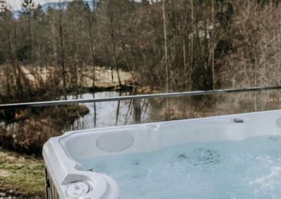 hot tub with view of cowichan custom carriage home