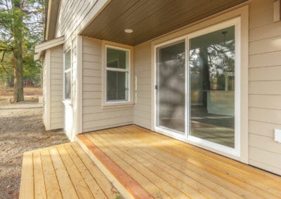 Covered wooden back deck