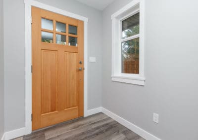 Wooden front door of custom home
