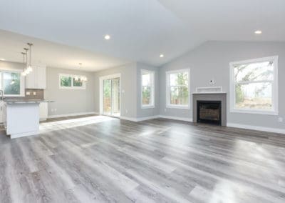 Mill Bay Spec Home living room with vaulted ceiling