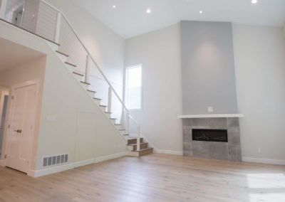 vaulted ceilings with custom hidden room under staircase