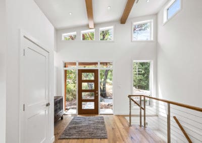 Vaulted ceilings and windows in front entryway