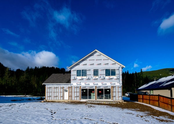 rear exterior framed lakeside home