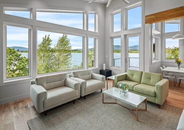 Lake views floor to ceiling windows modern lakefront home