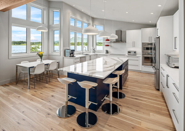 Modern kitchen, blue island, white cabinetry