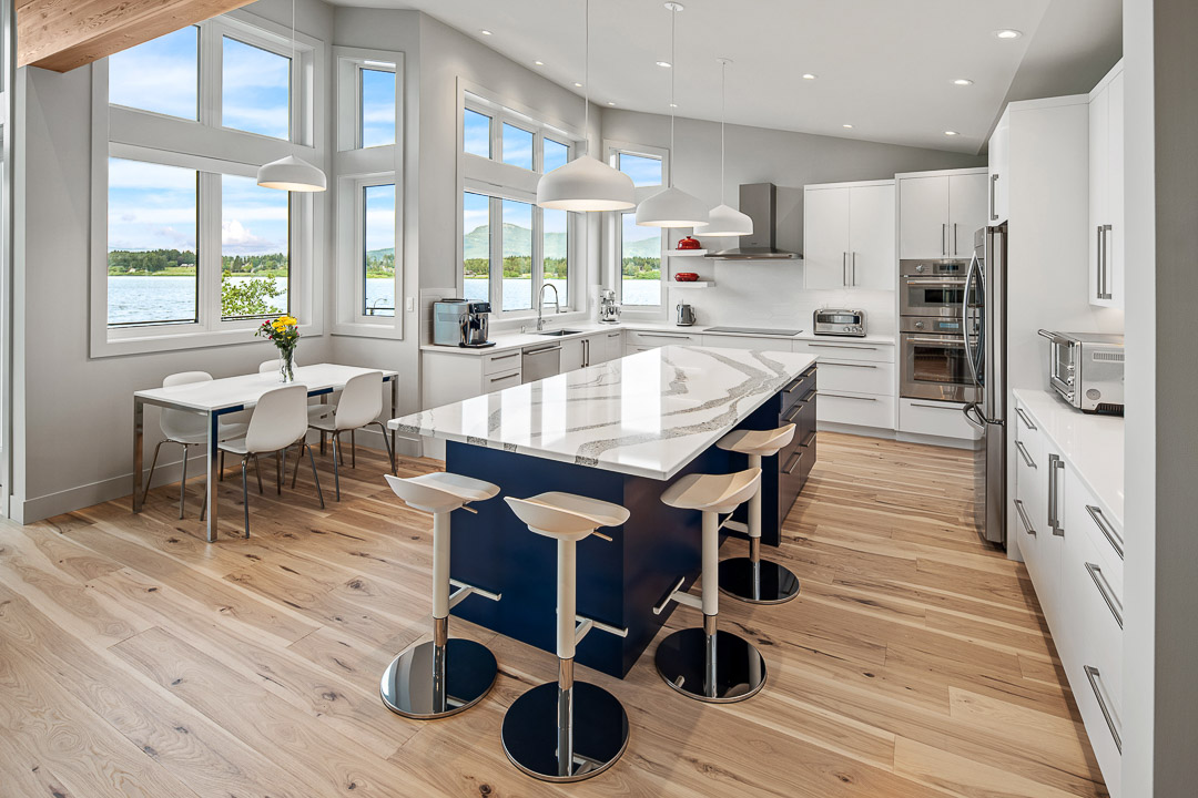 Modern kitchen, blue island, white cabinetry