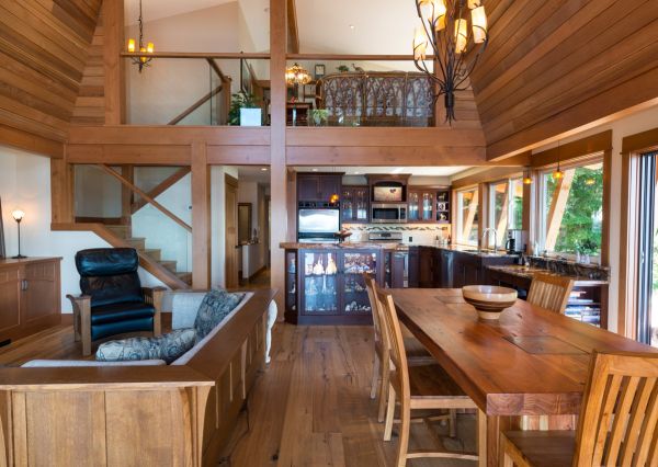 Dining area beneath vaulted A-frame ceilings