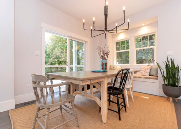 dining room with built in bench seating and chairs