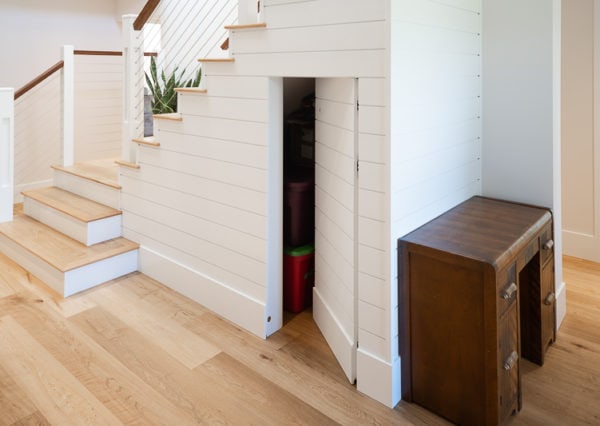 Hidden storage under staircase