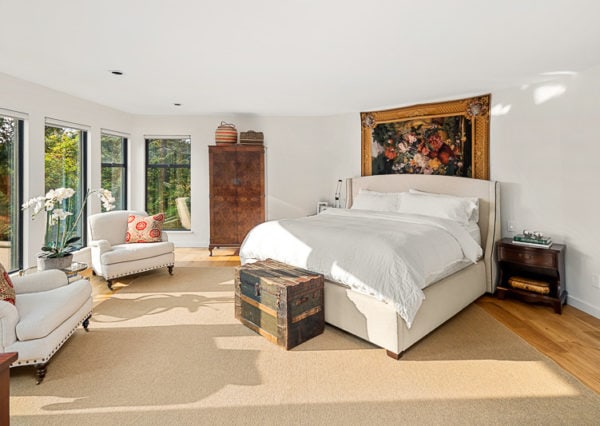 Large, angled master bedroom, light and airy