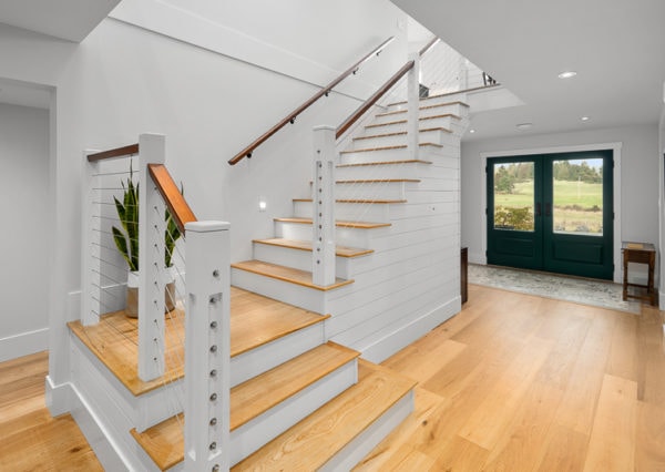 Cable railings and light coloured flooring