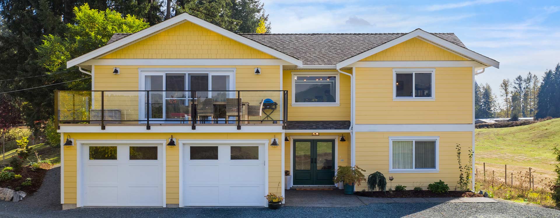 Pastoral-farmhouse-yellow-exterior Yellow modern farmhouse front exterior