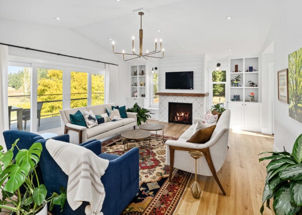 Modern farmhouse living room with accent fireplace