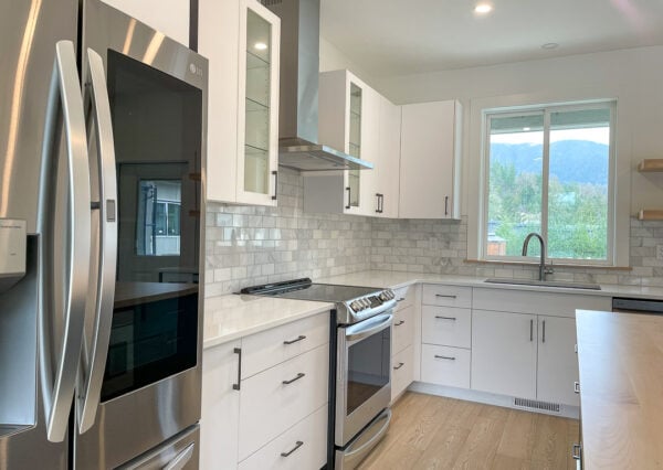 Stainless steel appliances in lakefront kitchen