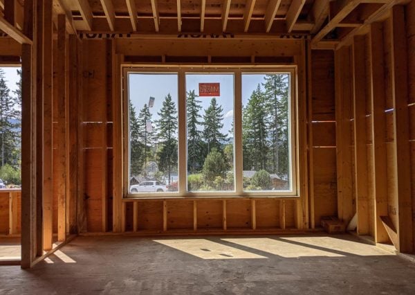 View of Cowichan Lake from inside custom home under construction