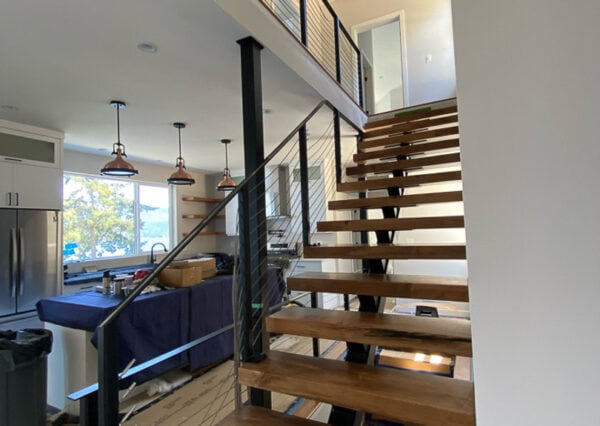 Modern staircase wood treads with metal railings