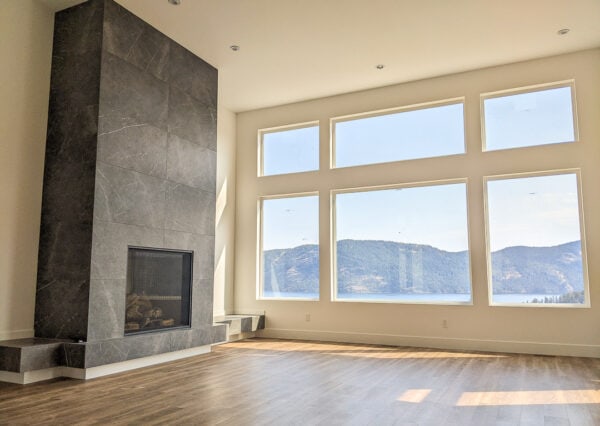 Tile fireplace in Seascape duplex custom home