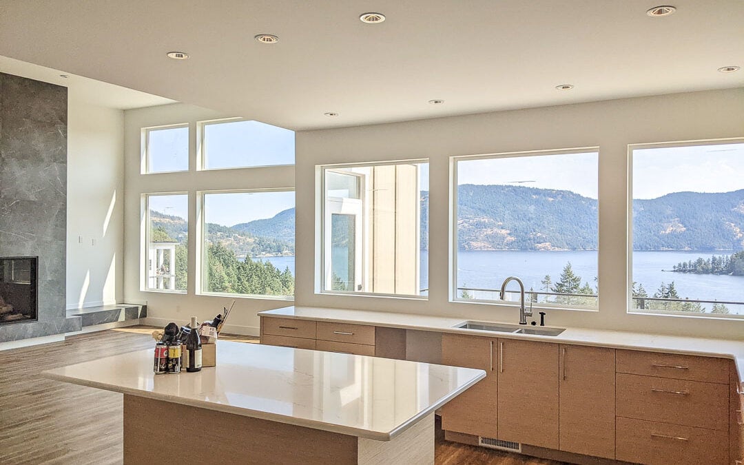 Kitchen facing ocean views in Cowichan Valley home