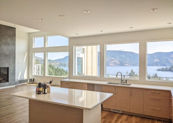 Kitchen facing ocean views in Cowichan Valley home