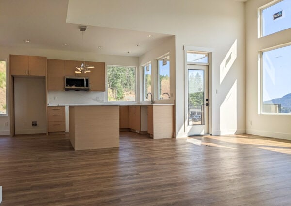 Kitchen with white countertop and wood cabinetry