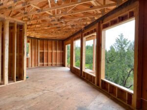 Bare Point Custom Home view from inside framing