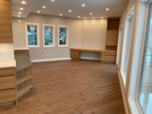 Flooring and cabinetry installed Bare Point Custom Home Renovation