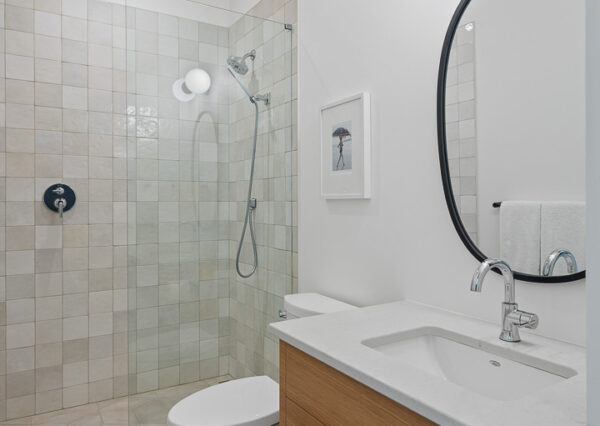 Bathroom Viewscape custom home, wood vanity, pattern floor