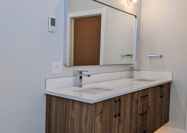 Floating double vanity in wood finish