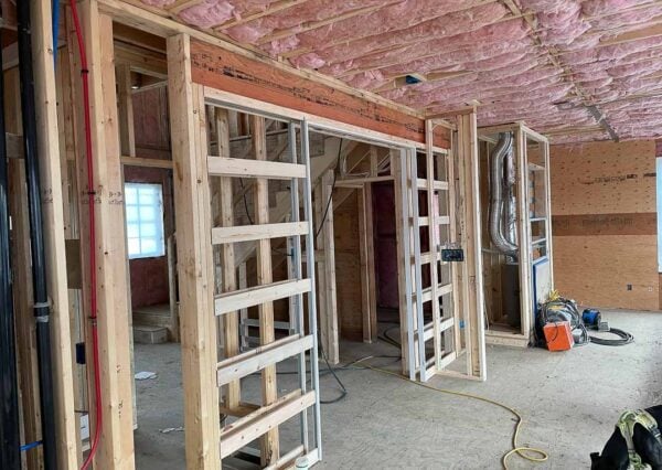 Interior sliding doors framing progress for dining room