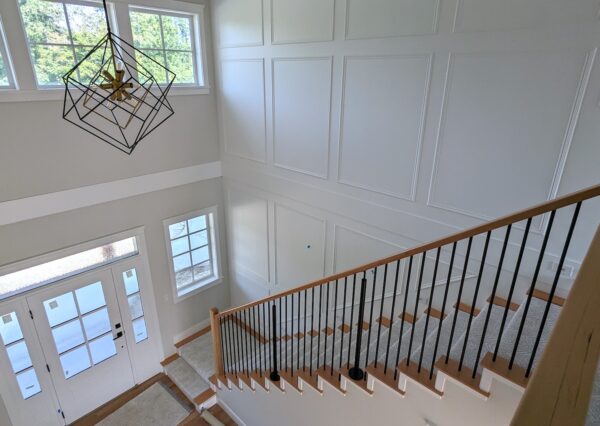 Custom stairwell and wall moldings in cowichan bay custom home.
