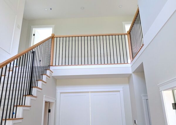 Stairwell and pocket doors by custom home builder