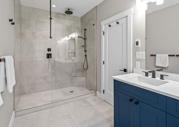 Tiled shower in bathroom