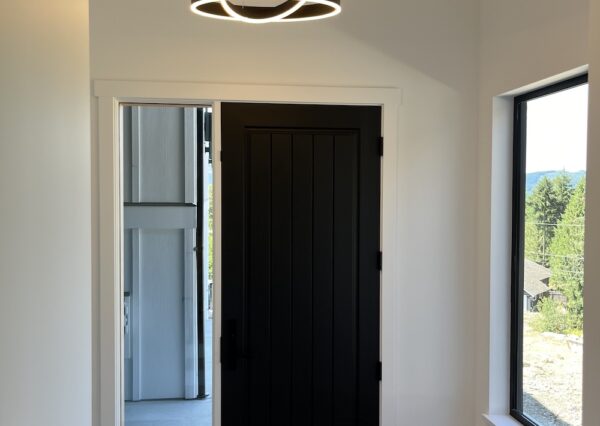 Front entrance with modern light fixture