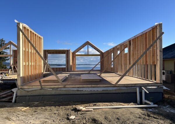 Framing a custom home in Mill Bay