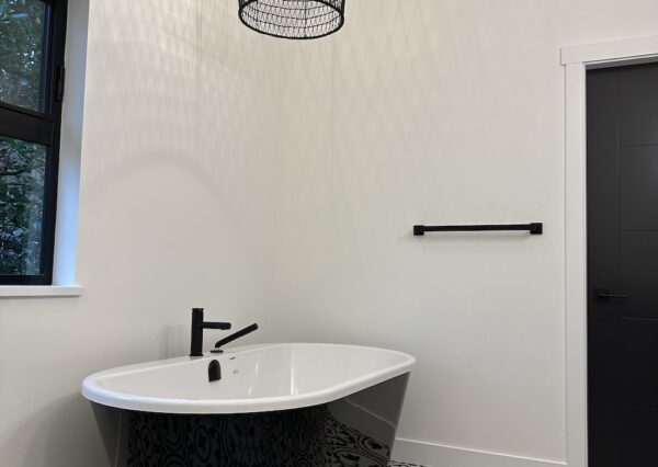 Freestanding bathtub in primary ensuite