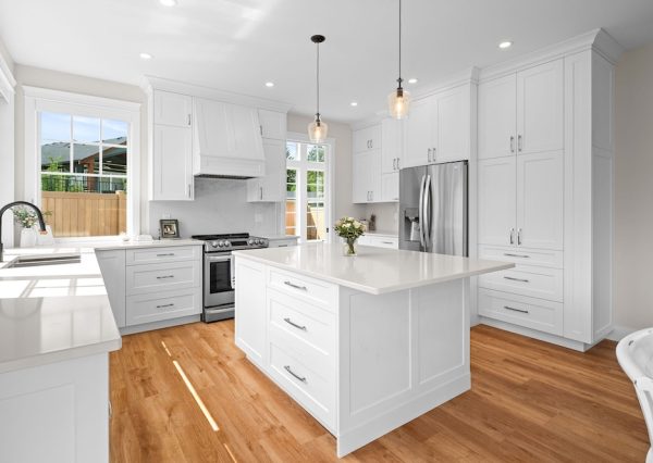 Custom white kitchen with lots of storage and natural light