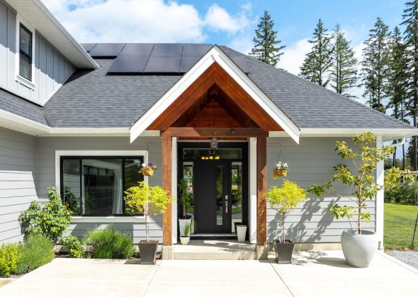 Front entrance with timber frame and black door