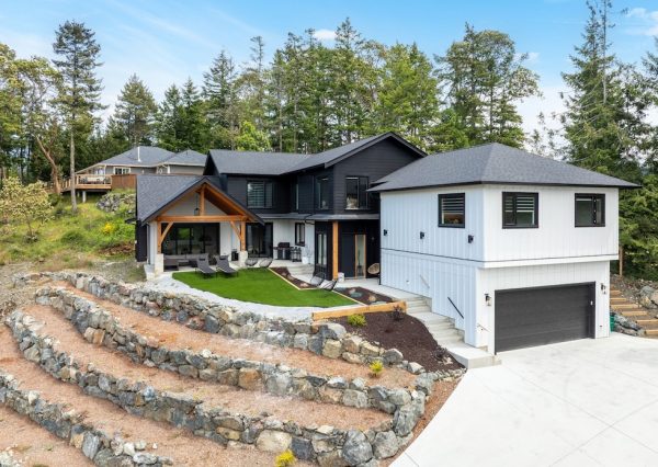 Custom built home in Shawnigan lake on steep property with rock retaining walls