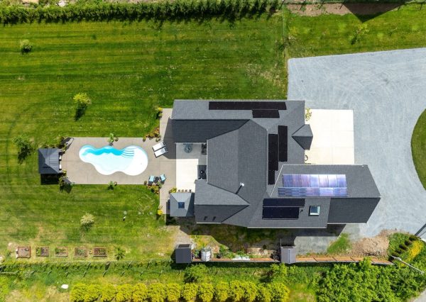 Custom home design on Vancouver Island with pool and solar panels