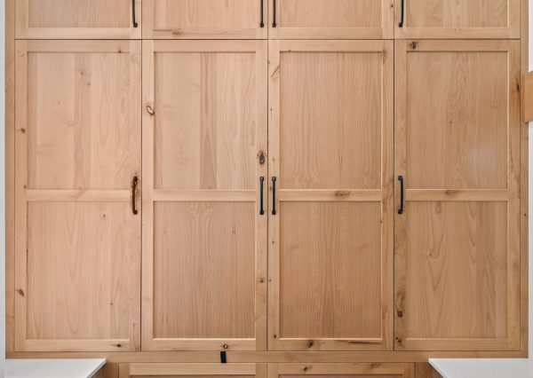 Large storage closet in front entrance of custom home