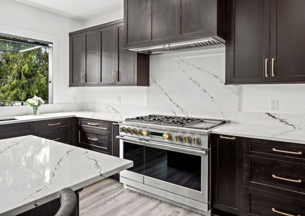 Gas burner range in large custom designed kitchen