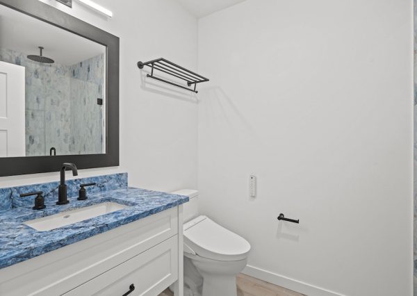 Guest bathroom with blue countertop