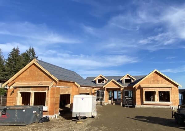 Framing custom home in Mill Bay