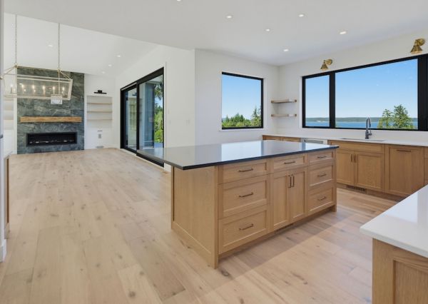 Custom wood and white kitchen with ocean views at The Inlet