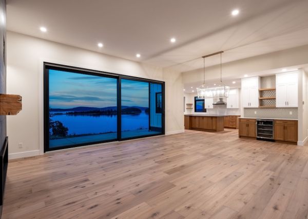 Open-concept great room and custom kitchen overlooking the ocean